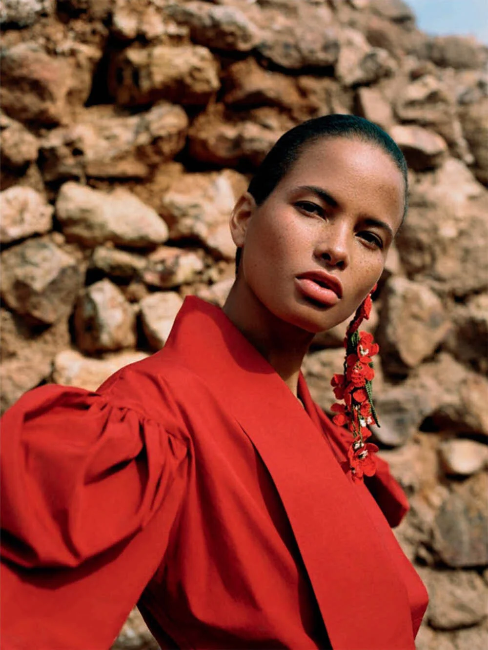 litza Veloz Wears Modern Red Style Drama for Vogue Spain February